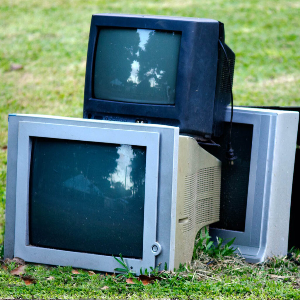 old tv set ready to be hauled away by Gent's junk removal