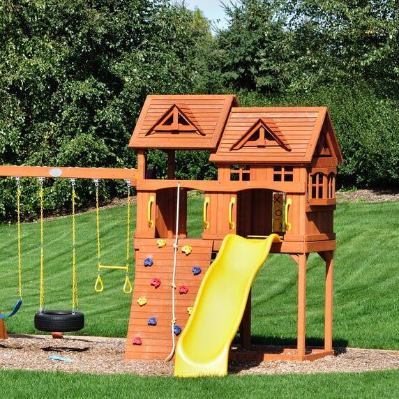 Wooden swing set in need of swing set removal services